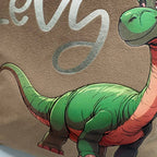 Kinderkissen Dino Samtoptik mit Name
